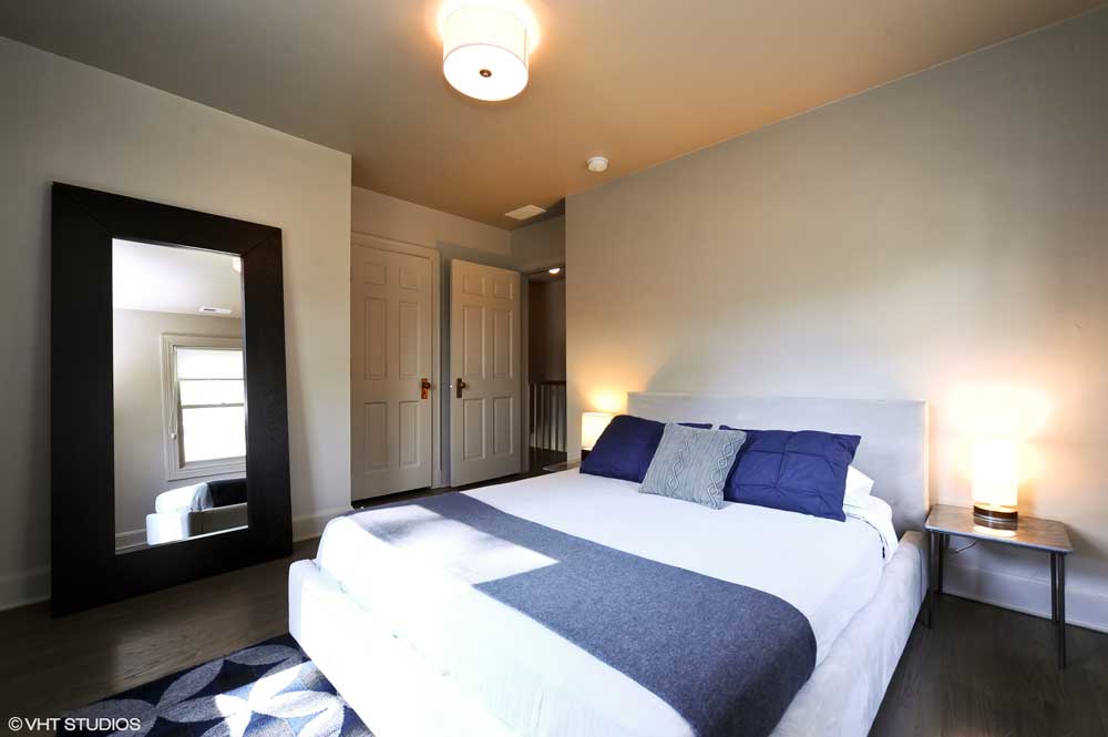 Westover Townhomes Bedroom with natural hardwood floors